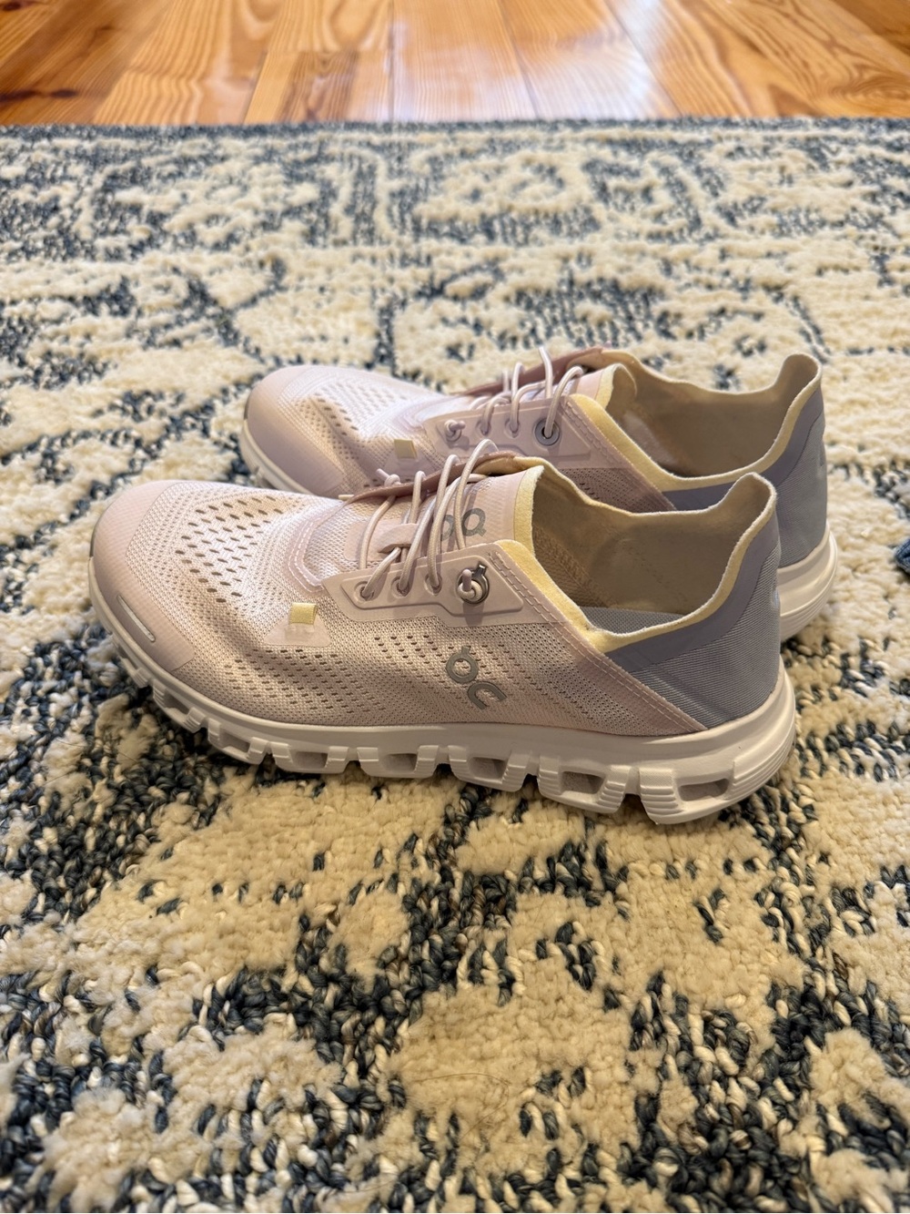 On Running Women’s Athletic Shoes in Pale Pink and Light Gray